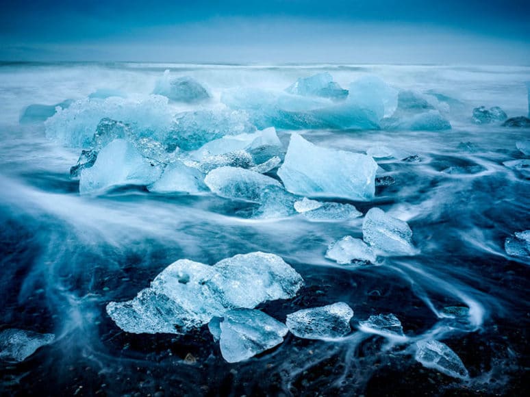 © Susanne Kremer Photography LLC | Blocks of ice on the black beach in Jokulsarlon