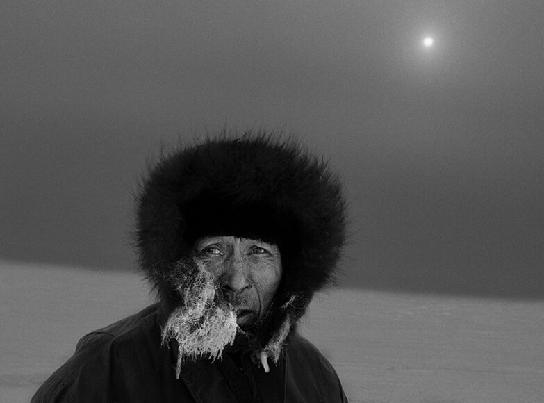 © Ragnar Axelsson, Hunter Kangertittivaq on the Sea Ice, Greenland, 1995.